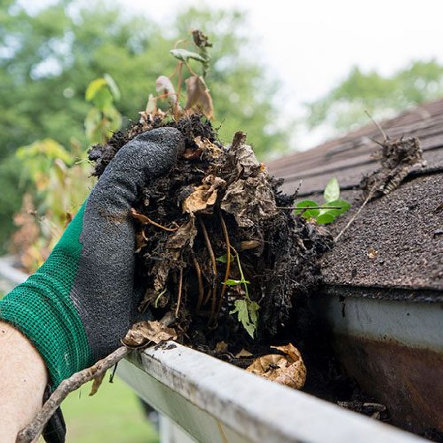 removing dirt from gutters